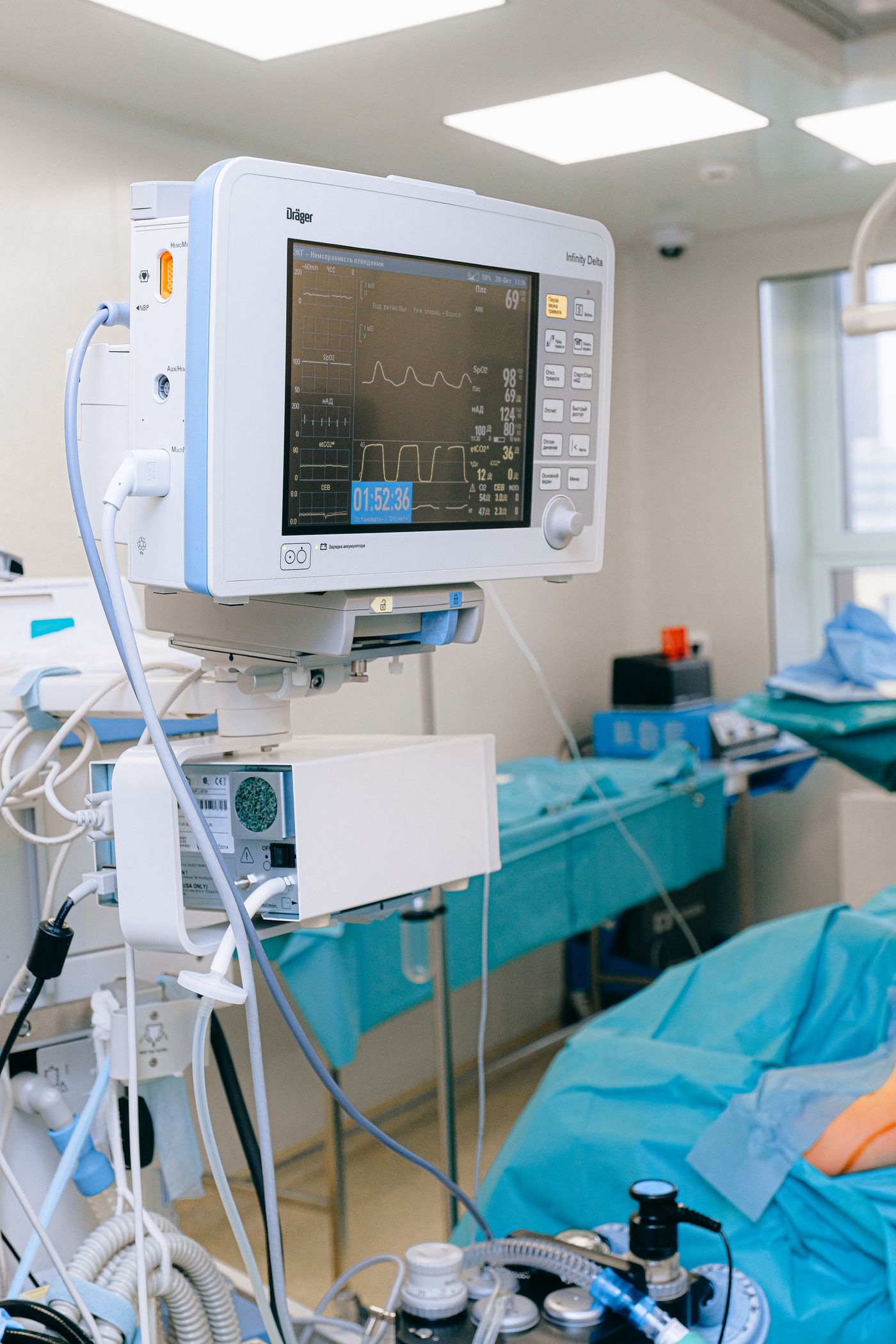 Hospital monitoring equipment in an operating theatre — the specialist layer that rarely reaches the last mile